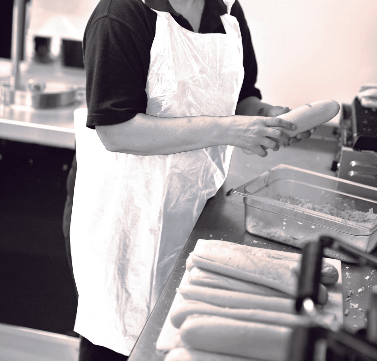 Șorț de unică folosință 69 x 107 cm din PE alb, 100 buc/pachet